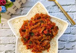 WHITE RICE WITH SMOKED FISH & STOCKFISH PALMOIL SAUCE